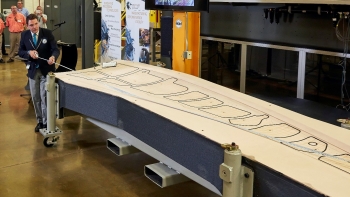 Official measurement of the 3D-printed trim tool printed at the Manufacturing Demonstration Facility at Oak Ridge National Laboratory (ORNL). Photo courtesy of ORNL. Official measurement of the 3D-printed trim tool printed at the Manufacturing Demonstration Facility at Oak Ridge National Laboratory (ORNL). Photo courtesy of ORNL.