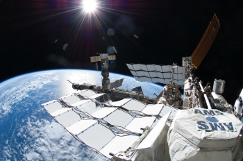 The Alpha Magnetic Spectrometer experiment is a particle detector which was lofted to the International Space Station onboard the Space Shuttle Endeavour about two years ago. | Image courtesy of NASA. The Alpha Magnetic Spectrometer experiment is a particle detector which was lofted to the International Space Station onboard the Space Shuttle Endeavour about two years ago. | Image courtesy of NASA.