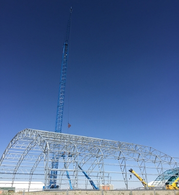 Crews erect the ninth and final building over a portion of a 97-acre landfill that accepted Rocky Flats-generated hazardous and radioactive waste from 1954 until 1970. Once the structure is completed in 2017, crews will exhume the last targeted waste at the landfill required under a 2008 record of decision between DOE, the state of Idaho, and Environmental Protection Agency. Crews erect the ninth and final building over a portion of a 97-acre landfill that accepted Rocky Flats-generated hazardous and radioactive waste from 1954 until 1970. Once the structure is completed in 2017, crews will exhume the last targeted waste at the landfill required under a 2008 record of decision between DOE, the state of Idaho, and Environmental Protection Agency.