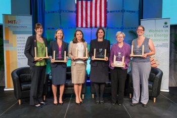 The hallmark of the 2013 Women in Clean Energy Symposium was the Clean Energy Education and Empowerment (C3E) awards ceremony, recognizing six women for their leadership and mentorship in clean energy fields. C3E award recipients (left to right): Kristen Graf, Kirstin Gunderson, Milo Werner, Rebecca Stanfield, Maxine Savitz (C3E 2013 Lifetime Achievement Award recipient), Erica Mackie. Not pictured: Katherine Lucey. | Photo by Justin Knight. The hallmark of the 2013 Women in Clean Energy Symposium was the Clean Energy Education and Empowerment (C3E) awards ceremony, recognizing six women for their leadership and mentorship in clean energy fields. C3E award recipients (left to right): Kristen Graf, Kirstin Gunderson, Milo Werner, Rebecca Stanfield, Maxine Savitz (C3E 2013 Lifetime Achievement Award recipient), Erica Mackie. Not pictured: Katherine Lucey. | Photo by Justin Knight.