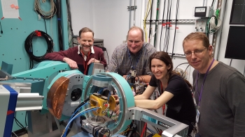 The SLAC/NREL research team poses with the rapid thermal processing instrument at SLAC, which allowed them to uncover how contact paste performs in solar modules. The SLAC/NREL research team poses with the rapid thermal processing instrument at SLAC, which allowed them to uncover how contact paste performs in solar modules.