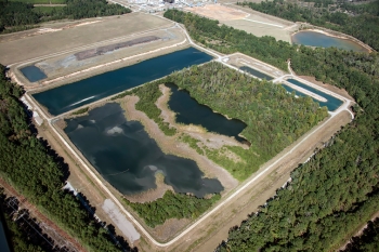 One of the coal-ash basins is shown before recent remediation efforts. One of the coal-ash basins is shown before recent remediation efforts.