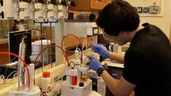 Jonathan Peters, a researcher at RTI International (an ARPA-E awardee), characterizes the water content of a bio-oil sample. | Courtesy of RTI International. Jonathan Peters, a researcher at RTI International (an ARPA-E awardee), characterizes the water content of a bio-oil sample. | Courtesy of RTI International.