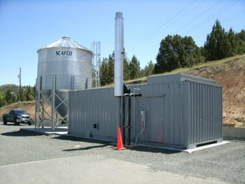 Using money from the Recovery Act, Blue Mountain Hospital replaced one of its 1950s crude oil boilers with a wood-pellet boiler -- saving the hospital about $100,000 a year in heating costs. | Photo courtesy of the Oregon Department of Energy. Using money from the Recovery Act, Blue Mountain Hospital replaced one of its 1950s crude oil boilers with a wood-pellet boiler -- saving the hospital about $100,000 a year in heating costs. | Photo courtesy of the Oregon Department of Energy.