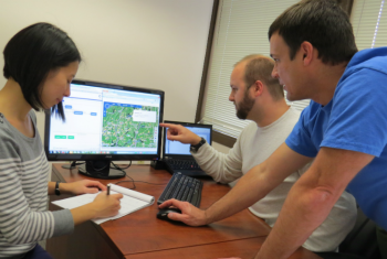 Workers from Clean Power Research review a software platform that aims to lower the costs associated with connecting distributed solar electricity generation to the grid. The platform is one of several projects funded through the Energy Departmentâs SunShot Incubator Program, which provides early-stage assistance to help small businesses cross technological barriers to commercialization. | Photo courtesy of Clean Power Research Workers from Clean Power Research review a software platform that aims to lower the costs associated with connecting distributed solar electricity generation to the grid. The platform is one of several projects funded through the Energy Departmentâs SunShot Incubator Program, which provides early-stage assistance to help small businesses cross technological barriers to commercialization. | Photo courtesy of Clean Power Research