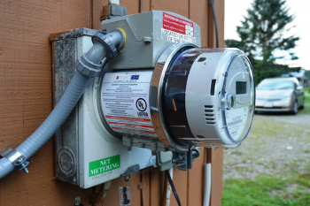 The ConnectDER device, seen above, sits in between the meter and the meter socket. The ConnectDER device, seen above, sits in between the meter and the meter socket.
