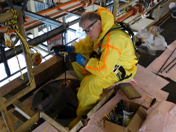 Thor Zollinger with Manta Robotics uses a rod to rotate the camera to perform the visual tank inspection with the HD camera. Thor Zollinger with Manta Robotics uses a rod to rotate the camera to perform the visual tank inspection with the HD camera.