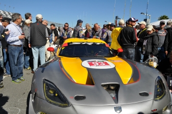 A crowd gathers around the SRT Viper GTLM car at the Rolex 24 at Daytona. | Photo by Natalie Committee, Energy Department A crowd gathers around the SRT Viper GTLM car at the Rolex 24 at Daytona. | Photo by Natalie Committee, Energy Department