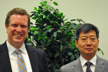 David Danielson (left), Assistant Secretary for Energy Efficiency and Renewable Energy, stands with Liang Zhipeng, Deputy Director General of the Department of New and Renewable Energy for Chinaâs National Energy Administration, at the fourth U.S.-China Renewable Energy Industries Forum in Washington, D.C. | <em>Photo by Josh Harmon</em> David Danielson (left), Assistant Secretary for Energy Efficiency and Renewable Energy, stands with Liang Zhipeng, Deputy Director General of the Department of New and Renewable Energy for Chinaâs National Energy Administration, at the fourth U.S.-China Renewable Energy Industries Forum in Washington, D.C. | <em>Photo by Josh Harmon</em>