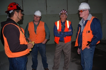 Longtime cleanup employee Kirk Dooley, far right. Longtime cleanup employee Kirk Dooley, far right.