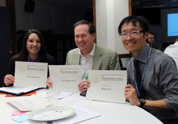 Kristen Honey (left), Christopher Irwin (center), and Bosco So were among the 16 recipients of Energy Innovation Awards at the networking breakfast before the first-ever Energy Open Data Roundtable on April 29 in Washington, D.C. | <em>Photo by Mike Mueller for the Energy Department</em> Kristen Honey (left), Christopher Irwin (center), and Bosco So were among the 16 recipients of Energy Innovation Awards at the networking breakfast before the first-ever Energy Open Data Roundtable on April 29 in Washington, D.C. | <em>Photo by Mike Mueller for the Energy Department</em>