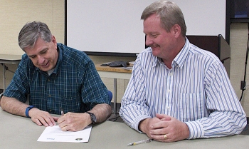 DOE-Idaho Deputy Manager Jack Zimmerman, right, and Fluor Idaho President and Project Manager Fred Hughes. DOE-Idaho Deputy Manager Jack Zimmerman, right, and Fluor Idaho President and Project Manager Fred Hughes.