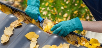 Cleaning your gutters will help prevent ice dams that can cause leaks and water damage. | Photo courtesy of ©iStockphoto.com/KatarzynaBialasiewicz Cleaning your gutters will help prevent ice dams that can cause leaks and water damage. | Photo courtesy of ©iStockphoto.com/KatarzynaBialasiewicz