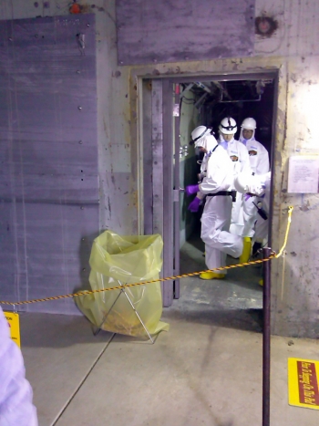 A safety team enters the H-Reactor for its initial safety evaluation and to verify conditions. A safety team enters the H-Reactor for its initial safety evaluation and to verify conditions.