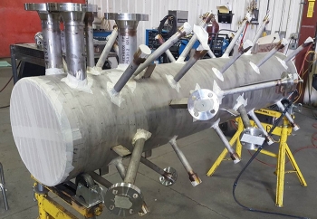 The small-scale replica of the Denitration Mineralization Reformer, part of the Integrated Waste Treatment Unitâs primary reaction vessel, will be used for testing scheduled in January. The small-scale replica of the Denitration Mineralization Reformer, part of the Integrated Waste Treatment Unitâs primary reaction vessel, will be used for testing scheduled in January.