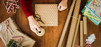 Wrap your gifts with recycled paper to reduce waste and save money. | Photo courtesy of istockphoto/diane555 Wrap your gifts with recycled paper to reduce waste and save money. | Photo courtesy of istockphoto/diane555