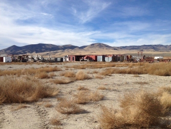 After RRG-9 ST1 was drilled, the rig was disassembled and stored at the drill site with the equipment used during the drilling. Photo source: Energy & Geoscience Institute at the University of Utah.
After RRG-9 ST1 was drilled, the rig was disassembled and stored at the drill site with the equipment used during the drilling. Photo source: Energy & Geoscience Institute at the University of Utah.