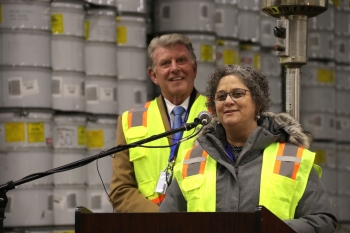 EM's Acting Assistant Secretary Sue Cange and Idaho's Governor C.L. "Butch" Otter speak to a crowd in celebration of the completion of the retrieval of over 53,000 cubic meters of waste at the Advanced Mixed Waste Treatment Project. EM's Acting Assistant Secretary Sue Cange and Idaho's Governor C.L. "Butch" Otter speak to a crowd in celebration of the completion of the retrieval of over 53,000 cubic meters of waste at the Advanced Mixed Waste Treatment Project.