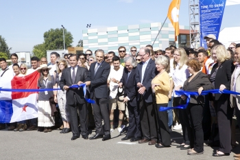 Secretary of Energy Ernest Moniz cuts the ceremonial ribbon to signal the start of U.S. Department of Energy Solar Decathlon 2015 in Irvine, California. | Photo by Matt Dozier, U.S. Department of Energy Secretary of Energy Ernest Moniz cuts the ceremonial ribbon to signal the start of U.S. Department of Energy Solar Decathlon 2015 in Irvine, California. | Photo by Matt Dozier, U.S. Department of Energy