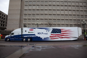 This Class 8 tractor-trailer by heavy-duty manufacturers Cummins and Peterbilt reaches more than 10 miles per gallon under real world driving conditions. The truck was on display at the Energy Department today. | Photo by <a href="http://www.energy.gov/contributors/sarah-gerrity">Sarah Gerrity</a>, Energy Department This Class 8 tractor-trailer by heavy-duty manufacturers Cummins and Peterbilt reaches more than 10 miles per gallon under real world driving conditions. The truck was on display at the Energy Department today. | Photo by <a href="http://www.energy.gov/contributors/sarah-gerrity">Sarah Gerrity</a>, Energy Department