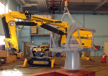 Shown here is a new robotic arm EM is seeking to acquire for AMWTP. Shown here is a new robotic arm EM is seeking to acquire for AMWTP.
