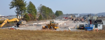 Workers size reduce and transport debris from Building K-731âs demolition. Workers size reduce and transport debris from Building K-731âs demolition.