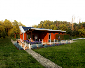 Made up of students from the University of Louisville, Ball State University and the University of Kentucky, the Kentucky/Indiana team decided to create a house that could serve as a permanent housing solution to a natural disaster. Above is a rendering of the team's final house. | Photo courtesy of the Energy Department. Made up of students from the University of Louisville, Ball State University and the University of Kentucky, the Kentucky/Indiana team decided to create a house that could serve as a permanent housing solution to a natural disaster. Above is a rendering of the team's final house. | Photo courtesy of the Energy Department.