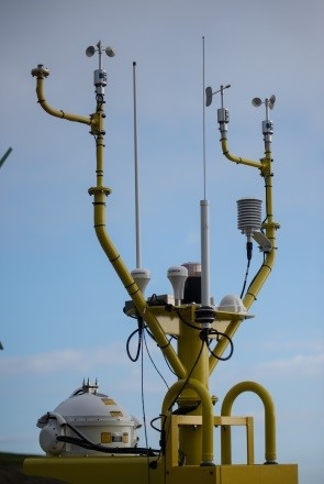 Meteorological instruments aboard the Energy Departmentâs offshore wind power research buoys include anemometers (small white spinning cups on towers) and LiDAR (large white ball at bottom), among many others. These instruments provide data that will help improve offshore turbine performance and reduce barriers to investment in large-scale offshore wind energy development. Photo courtesy of Pacific Northwest National Laboratory. Meteorological instruments aboard the Energy Departmentâs offshore wind power research buoys include anemometers (small white spinning cups on towers) and LiDAR (large white ball at bottom), among many others. These instruments provide data that will help improve offshore turbine performance and reduce barriers to investment in large-scale offshore wind energy development. Photo courtesy of Pacific Northwest National Laboratory.