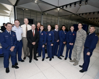 Federal Energy Management Program Director Dr. Timothy Unruh (fourth from left) with Air Force Academy staff and students. The Air Force Academy team won a DOE Excellence in Energy Award for their microgrid design that featured two biomass-fired combined heat & power facilities, fuel cells, and a complex load management scheme. | Photo courtesy of Air Force Academy Federal Energy Management Program Director Dr. Timothy Unruh (fourth from left) with Air Force Academy staff and students. The Air Force Academy team won a DOE Excellence in Energy Award for their microgrid design that featured two biomass-fired combined heat & power facilities, fuel cells, and a complex load management scheme. | Photo courtesy of Air Force Academy