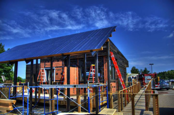 The Middlebury College team chose to design their house for its final placement in the teamâs hometown of Middlebury, Vermont. The result: The team created a Solar Path -- a walkway under the free-standing solar panels to the front of the house. | Photo courtesy of Middlebury College. The Middlebury College team chose to design their house for its final placement in the teamâs hometown of Middlebury, Vermont. The result: The team created a Solar Path -- a walkway under the free-standing solar panels to the front of the house. | Photo courtesy of Middlebury College.