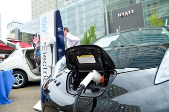 The Denver Metro Clean Cities partnered with the Colorado Renewable Energy Society to host Electric Avenue, a public event showcasing electric vehicles and charging equipment that took place in downtown Denver in May 2012. | Photo by Natalia Swalnick. The Denver Metro Clean Cities partnered with the Colorado Renewable Energy Society to host Electric Avenue, a public event showcasing electric vehicles and charging equipment that took place in downtown Denver in May 2012. | Photo by Natalia Swalnick.