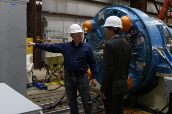 NREL researchers are completing testing of a next-generation drivetrain, shown here undergoing rigorous tests at the National Wind Technology Centerâs 2.5-megawatt dynamometer. NRELâs testing validates the technology prior to commercialization. Shown here are NREL senior engineer and project lead Jonathan Keller (left) and DOE technology manager Nick Johnson. Photo by Malone Media. NREL researchers are completing testing of a next-generation drivetrain, shown here undergoing rigorous tests at the National Wind Technology Centerâs 2.5-megawatt dynamometer. NRELâs testing validates the technology prior to commercialization. Shown here are NREL senior engineer and project lead Jonathan Keller (left) and DOE technology manager Nick Johnson. Photo by Malone Media.