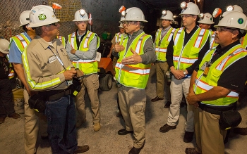 Waste Isolation Pilot Plant employees discuss waste emplacement operations with Energy Secretary Rick Perry, center, while inside the facility 2,150 feet underground. Waste Isolation Pilot Plant employees discuss waste emplacement operations with Energy Secretary Rick Perry, center, while inside the facility 2,150 feet underground.