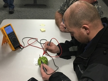 Students, including engineers and electricians, attending a DOE Training Institute battery safety training at Idaho National Laboratory create âbatteriesâ using fruits and vegetables and dissimilar metals. Students, including engineers and electricians, attending a DOE Training Institute battery safety training at Idaho National Laboratory create âbatteriesâ using fruits and vegetables and dissimilar metals.