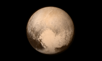This image of Pluto, taken by New Horizons after a 9 1/2-year journey, is our highest-resolution photo of the dwarf planet since its discovery by Clyde Tombaugh in 1930. | Photo courtesy of NASA. This image of Pluto, taken by New Horizons after a 9 1/2-year journey, is our highest-resolution photo of the dwarf planet since its discovery by Clyde Tombaugh in 1930. | Photo courtesy of NASA.