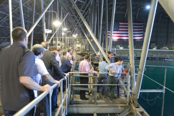 The Wave Energy Prize teams got to tour the 12-million gallon Maneuvering and Seakeeping (MASK) Basin at the U.S. Navy's Carderock facility in Maryland, where their devices will be tested this summer. The Wave Energy Prize teams got to tour the 12-million gallon Maneuvering and Seakeeping (MASK) Basin at the U.S. Navy's Carderock facility in Maryland, where their devices will be tested this summer.