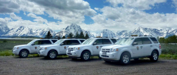 These hybrid Ford Escape vehicles at Grand Teton National Park were purchased with support from the Clean Cities National Parks Initiative. Photo | NREL These hybrid Ford Escape vehicles at Grand Teton National Park were purchased with support from the Clean Cities National Parks Initiative. Photo | NREL