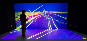 Researchers at the National Renewables Energy Laboratory get creative with data with a virtual wind tunnel. | Photo courtesy of the Energy Department. Researchers at the National Renewables Energy Laboratory get creative with data with a virtual wind tunnel. | Photo courtesy of the Energy Department.