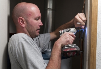 Sealing air leaks will help to decrease heating and cooling costs and make your home more comfortable. | Photo courtesy of Dennis Schroeder, National Renewable Energy Laboratory Sealing air leaks will help to decrease heating and cooling costs and make your home more comfortable. | Photo courtesy of Dennis Schroeder, National Renewable Energy Laboratory