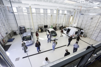 Researchers at the National Renewable Energy Lab showcase innovation at their Vehicle Testing and Integration Facility. | Photo Courtesy of NREL. Researchers at the National Renewable Energy Lab showcase innovation at their Vehicle Testing and Integration Facility. | Photo Courtesy of NREL.