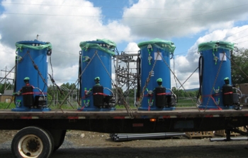 Seven-foot tall cylinders equipped with flywheel technology (shown above) will make up Beacon Powerâs energy storage plant in Stephentown, N.Y. The company received a $43 million loan guarantee from the Energy Department to build the plant. | Photo courtesy of Beacon Power Corporation Seven-foot tall cylinders equipped with flywheel technology (shown above) will make up Beacon Powerâs energy storage plant in Stephentown, N.Y. The company received a $43 million loan guarantee from the Energy Department to build the plant. | Photo courtesy of Beacon Power Corporation