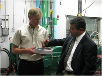 ARPA-E Director Dr. Arun Majumdar and MSU Project Lead Dr. Norbert Mueller test the wave disk engine. ARPA-E Director Dr. Arun Majumdar and MSU Project Lead Dr. Norbert Mueller test the wave disk engine.