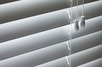 Blinds are a great option for cooling your home in the summer. | Photo courtesy of ©iStockphoto/nycshooter Blinds are a great option for cooling your home in the summer. | Photo courtesy of ©iStockphoto/nycshooter