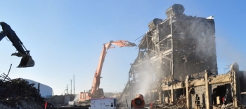 A view of the north end of the K-25 Building moments before it was demolished today. A view of the north end of the K-25 Building moments before it was demolished today.
