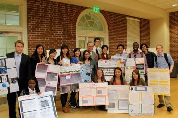 Students from the University of Maryland's "Designing a Sustainable World" class (Spring 2013), display their end projects. The course used the <a href="http://www1.eere.energy.gov/education/energy_101.html">Energy 101</a>, peer reviewed course framework using the energy literacy principles for higher education. The general education course encouraged students from varying majors to think critically about energy consumption and conservation in their daily lives. More than 90% of the students indicated that the course, which culminated with end-of-semester design projects, helped them understand the complex issues and problems surrounding energy. The University of Maryland hopes to offer future courses that use the Energy Literacy Principles. | <em> Photo courtesy of the University of Maryland </em> Students from the University of Maryland's "Designing a Sustainable World" class (Spring 2013), display their end projects. The course used the <a href="http://www1.eere.energy.gov/education/energy_101.html">Energy 101</a>, peer reviewed course framework using the energy literacy principles for higher education. The general education course encouraged students from varying majors to think critically about energy consumption and conservation in their daily lives. More than 90% of the students indicated that the course, which culminated with end-of-semester design projects, helped them understand the complex issues and problems surrounding energy. The University of Maryland hopes to offer future courses that use the Energy Literacy Principles. | <em> Photo courtesy of the University of Maryland </em>