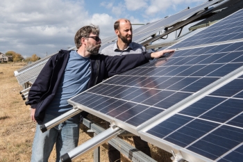 Researchers monitor the progress of the new photovoltaic array at the National Renewable Energy Laboratory. Photo Courtesy | National Renewable Energy Laboratory Researchers monitor the progress of the new photovoltaic array at the National Renewable Energy Laboratory. Photo Courtesy | National Renewable Energy Laboratory