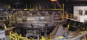 General Dynamics' Bliss Three Forge Furnace is a natural gas-fired rotary hearth furnace used to heat steel before forging. Refurbished with a new high performance refractory, high efficiency burner controls, and natural gas recuperators, the furnace improvements translated into a 25% reduction in natural gas consumption. Photo credit: General Dynamics. General Dynamics' Bliss Three Forge Furnace is a natural gas-fired rotary hearth furnace used to heat steel before forging. Refurbished with a new high performance refractory, high efficiency burner controls, and natural gas recuperators, the furnace improvements translated into a 25% reduction in natural gas consumption. Photo credit: General Dynamics.