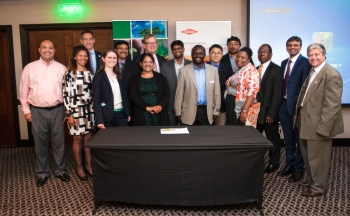 New partnerships between U.S. and South African organizations were recognized during a signing ceremony at the Powering South Africa Conference. From left to right: Jaime Cruz, Millenium Solutions; Edwina Felix, Peer Africa; Carsten Larsen, Dow; Sheila Moynihan, EERE; Bipin Shah, WinBuild; Teresa Scheepers, Municipal Manger of !Khies; Minister Counselor Laird Treiber, U.S. Embassy; Logesh Janarthanan, EMPORes LLC; Dr. Xiahohua Xia, University of Pretoria; Mothusi Guy, PEER Africa; Nothemba Mlonzi, SANEDI Board of Directors; David Mahuma, SANEDI; Dr. Ravi Srinivasan, University of Florida; Barry Bredenkamp, SANEDI. | <em>Photo credit: Ignus Gerber Photography</em> New partnerships between U.S. and South African organizations were recognized during a signing ceremony at the Powering South Africa Conference. From left to right: Jaime Cruz, Millenium Solutions; Edwina Felix, Peer Africa; Carsten Larsen, Dow; Sheila Moynihan, EERE; Bipin Shah, WinBuild; Teresa Scheepers, Municipal Manger of !Khies; Minister Counselor Laird Treiber, U.S. Embassy; Logesh Janarthanan, EMPORes LLC; Dr. Xiahohua Xia, University of Pretoria; Mothusi Guy, PEER Africa; Nothemba Mlonzi, SANEDI Board of Directors; David Mahuma, SANEDI; Dr. Ravi Srinivasan, University of Florida; Barry Bredenkamp, SANEDI. | <em>Photo credit: Ignus Gerber Photography</em>
