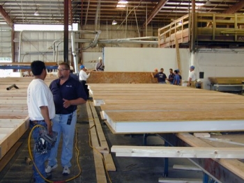 These structural insulated panels consist of foam insulation sandwiched between oriented strand boards. (Courtesy of Michael Bacchler) These structural insulated panels consist of foam insulation sandwiched between oriented strand boards. (Courtesy of Michael Bacchler)