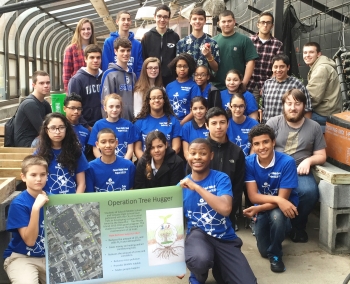 Students participating in the NEED Project at Scituate High and Calcutt Middle Schools planted 14 trees in Central Falls, Rhode Island. Students participating in the NEED Project at Scituate High and Calcutt Middle Schools planted 14 trees in Central Falls, Rhode Island.